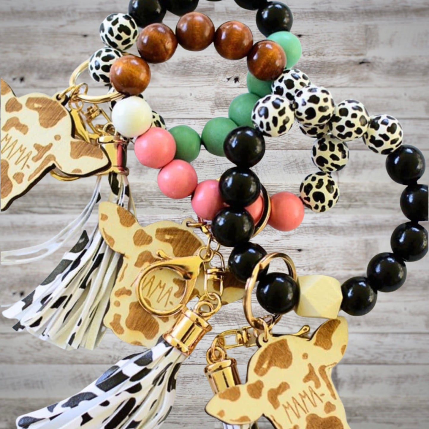 “Mama” Wooden Bead Cow Print Bracelet Keychain with Tassel